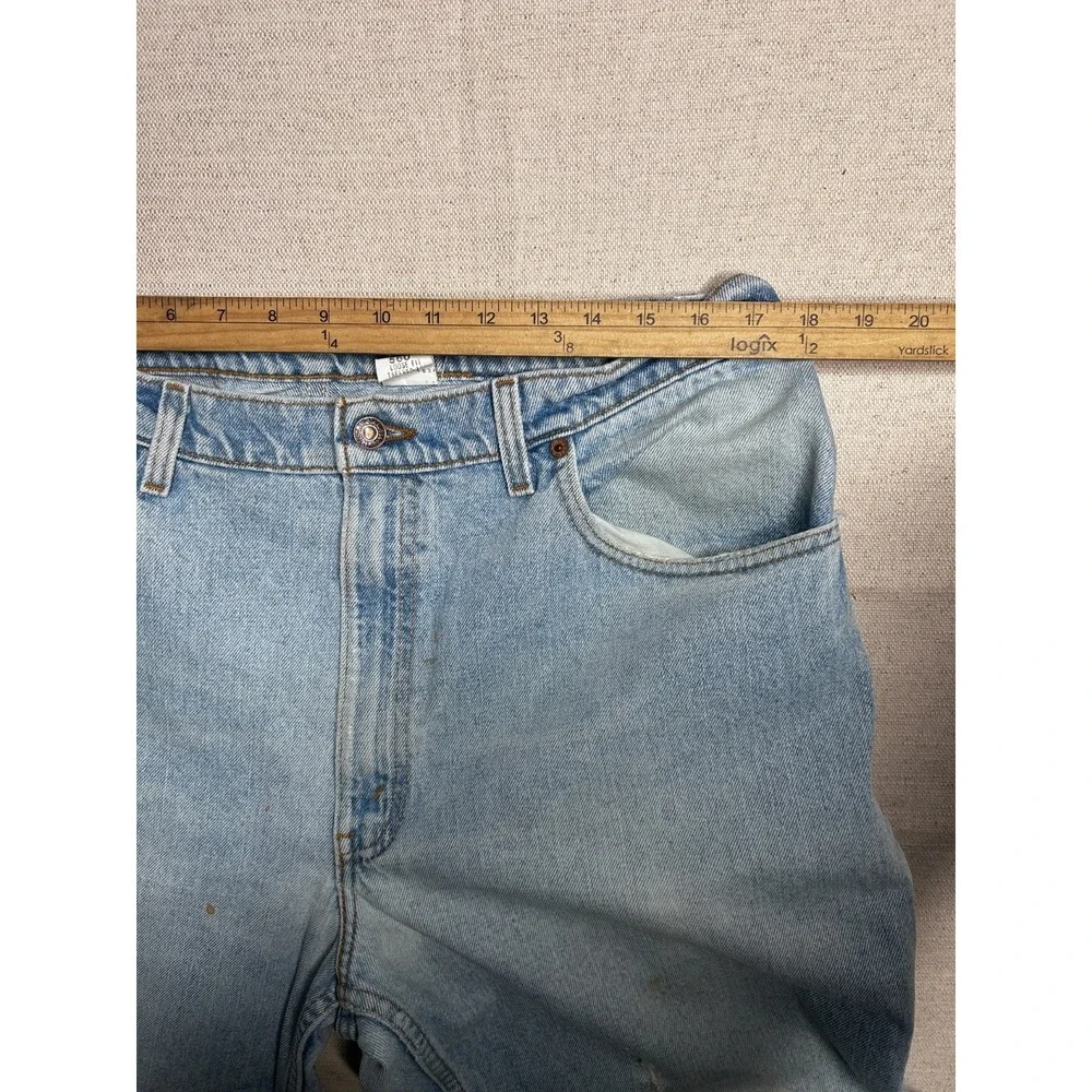Vintage Levi's 560 Jeans Men's 38x30 Loose Fit Tapered Leg Light Wash USA